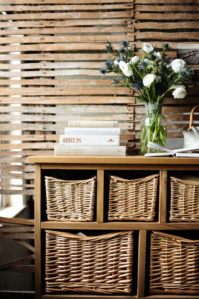 Books, wicker, farmhouse, exposed wall, thistles, roses