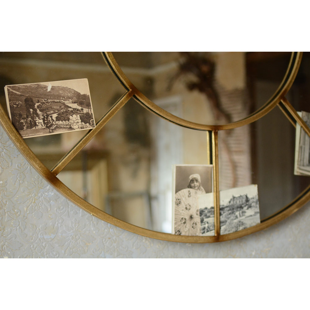 Circular mirror, hallway, vintage postcards, textured wallpaper