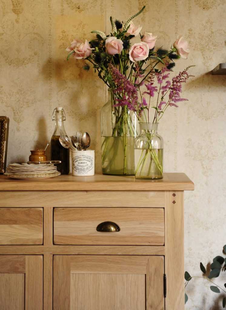 Flowers, oak furniture, roses, eucalyptus, sideboard