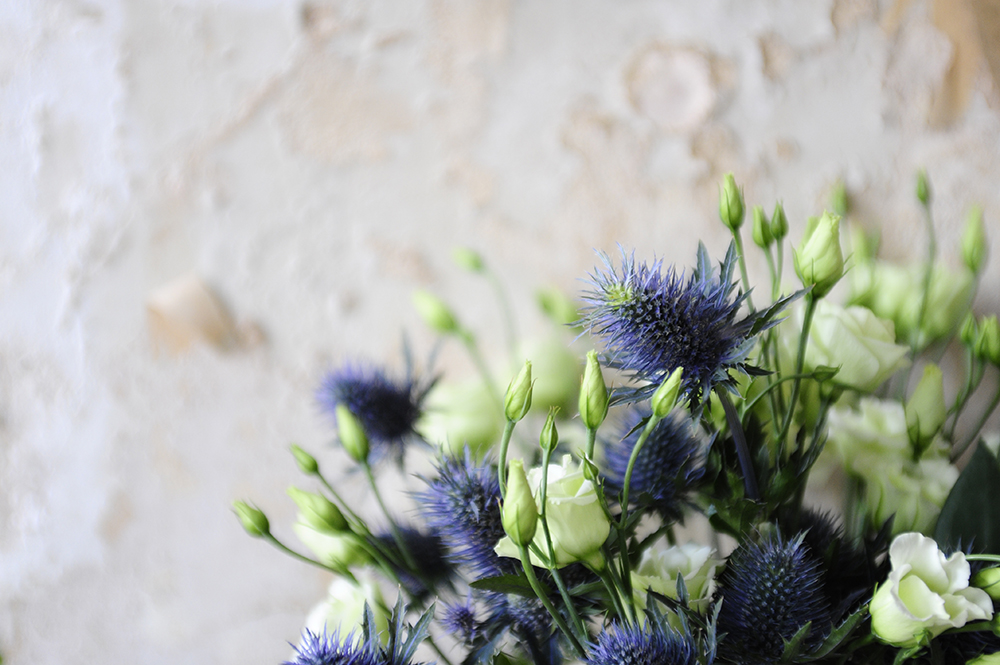 lisianthus, thistles, aging wall, styling, flowers