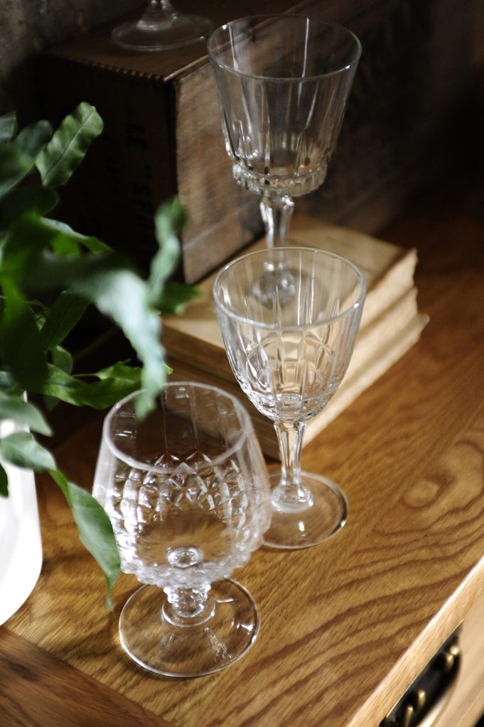 Oak grain, rustic dining furniture, wine glasses