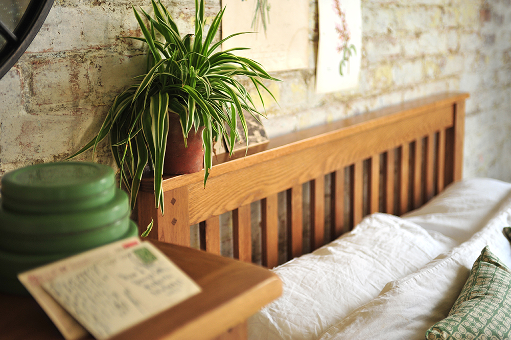 Rustic Oak bedroom, Spider plant, bedstead, green accessories